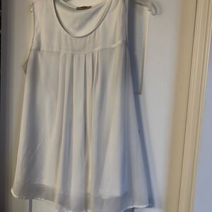 Sleeveless White Pleated Swing Tank Top